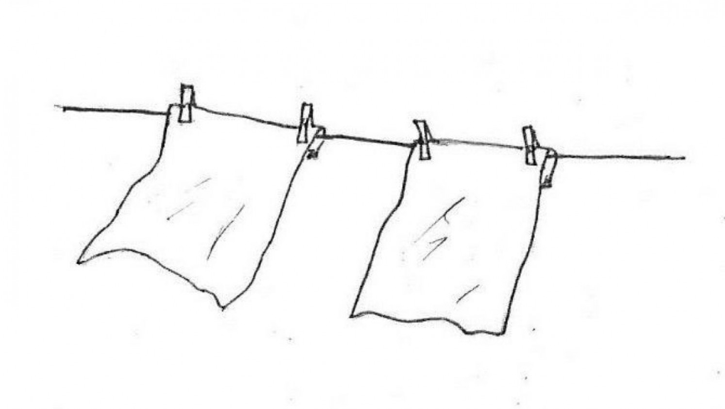 Grobstaub in der Luft kann durch an der Wäscheleine aufgehängte weiße Tücher sichtbar gemacht werden.